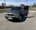 Серый БМВ Х5, объемом двигателя 3 л и пробегом 325 тыс. км за 5550 $, фото 1 на Automoto.ua