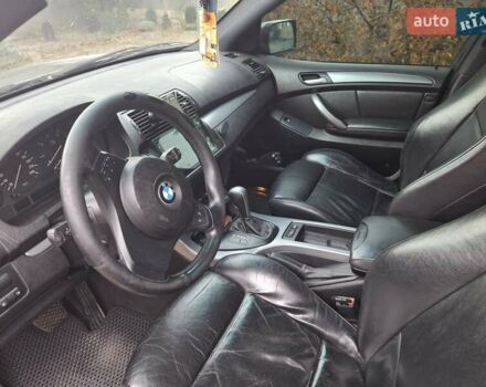Серый БМВ Х5, объемом двигателя 3 л и пробегом 330 тыс. км за 11400 $, фото 12 на Automoto.ua