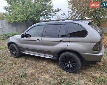 Серый БМВ Х5, объемом двигателя 3 л и пробегом 330 тыс. км за 11400 $, фото 4 на Automoto.ua