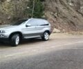 Серый БМВ Х5, объемом двигателя 3 л и пробегом 273 тыс. км за 12000 $, фото 4 на Automoto.ua