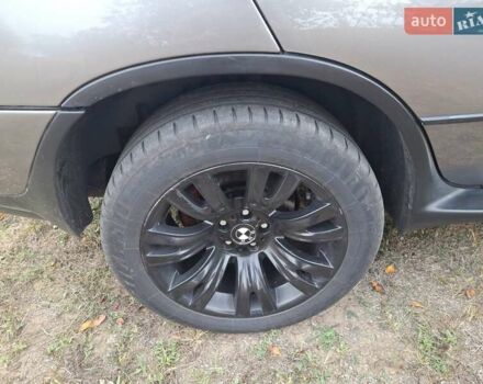 Серый БМВ Х5, объемом двигателя 3 л и пробегом 330 тыс. км за 11400 $, фото 14 на Automoto.ua