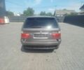 Серый БМВ Х5, объемом двигателя 3 л и пробегом 350 тыс. км за 6200 $, фото 1 на Automoto.ua