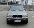 Серый БМВ Х5, объемом двигателя 3 л и пробегом 224 тыс. км за 12000 $, фото 1 на Automoto.ua
