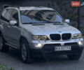 Серый БМВ Х5, объемом двигателя 3 л и пробегом 370 тыс. км за 10000 $, фото 1 на Automoto.ua