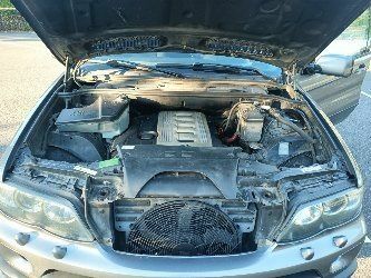 Серый БМВ Х5, объемом двигателя 3 л и пробегом 487 тыс. км за 11700 $, фото 23 на Automoto.ua