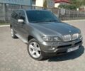 Серый БМВ Х5, объемом двигателя 3 л и пробегом 300 тыс. км за 11999 $, фото 1 на Automoto.ua
