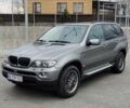 Серый БМВ Х5, объемом двигателя 3 л и пробегом 224 тыс. км за 12000 $, фото 1 на Automoto.ua