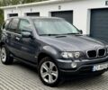 Серый БМВ Х5, объемом двигателя 3 л и пробегом 243 тыс. км за 3118 $, фото 1 на Automoto.ua
