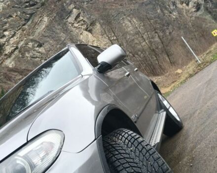 Серый БМВ Х5, объемом двигателя 3 л и пробегом 273 тыс. км за 12000 $, фото 1 на Automoto.ua