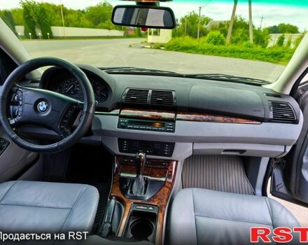 Серый БМВ Х5, объемом двигателя 3 л и пробегом 294 тыс. км за 8450 $, фото 6 на Automoto.ua