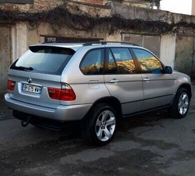 Серый БМВ Х5, объемом двигателя 3 л и пробегом 340 тыс. км за 6500 $, фото 2 на Automoto.ua