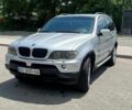 Серый БМВ Х5, объемом двигателя 3 л и пробегом 320 тыс. км за 11500 $, фото 1 на Automoto.ua