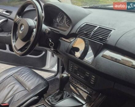 Серый БМВ Х5, объемом двигателя 4.4 л и пробегом 301 тыс. км за 9500 $, фото 19 на Automoto.ua