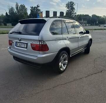 Серый БМВ Х5, объемом двигателя 3 л и пробегом 400 тыс. км за 11800 $, фото 7 на Automoto.ua