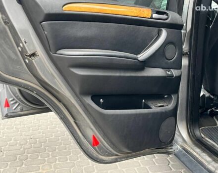 Серый БМВ Х5, объемом двигателя 3 л и пробегом 378 тыс. км за 12690 $, фото 42 на Automoto.ua