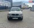 Серый БМВ Х5, объемом двигателя 3 л и пробегом 320 тыс. км за 8450 $, фото 4 на Automoto.ua