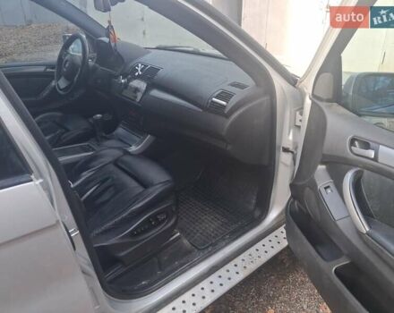 Серый БМВ Х5, объемом двигателя 3 л и пробегом 252 тыс. км за 12800 $, фото 4 на Automoto.ua