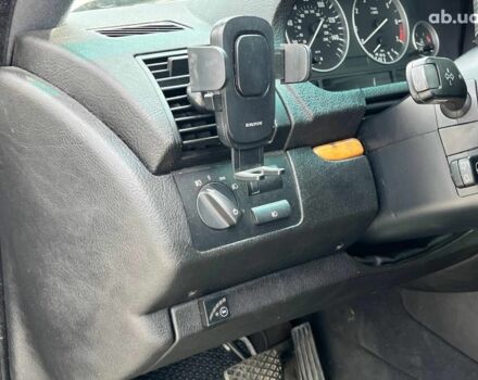 Серый БМВ Х5, объемом двигателя 3 л и пробегом 378 тыс. км за 12690 $, фото 12 на Automoto.ua