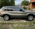Серый БМВ Х5, объемом двигателя 3 л и пробегом 340 тыс. км за 11500 $, фото 1 на Automoto.ua
