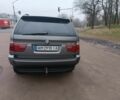 Серый БМВ Х5, объемом двигателя 3 л и пробегом 445 тыс. км за 11000 $, фото 4 на Automoto.ua