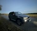 Серый БМВ Х5, объемом двигателя 3 л и пробегом 320 тыс. км за 6800 $, фото 1 на Automoto.ua