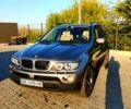 Серый БМВ Х5, объемом двигателя 3 л и пробегом 256 тыс. км за 10000 $, фото 2 на Automoto.ua