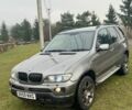 Серый БМВ Х5, объемом двигателя 3 л и пробегом 150 тыс. км за 4653 $, фото 2 на Automoto.ua