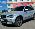 Серый БМВ Х5, объемом двигателя 3 л и пробегом 297 тыс. км за 14900 $, фото 1 на Automoto.ua