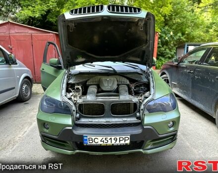 Серый БМВ Х5, объемом двигателя 4.8 л и пробегом 303 тыс. км за 14000 $, фото 6 на Automoto.ua