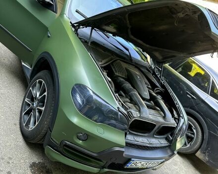 Серый БМВ Х5, объемом двигателя 4.8 л и пробегом 303 тыс. км за 14000 $, фото 7 на Automoto.ua