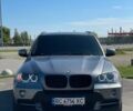 Серый БМВ Х5, объемом двигателя 3 л и пробегом 297 тыс. км за 13999 $, фото 1 на Automoto.ua