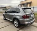 Серый БМВ Х5, объемом двигателя 3 л и пробегом 309 тыс. км за 12000 $, фото 2 на Automoto.ua