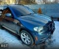 Серый БМВ Х5, объемом двигателя 3 л и пробегом 230 тыс. км за 16000 $, фото 1 на Automoto.ua