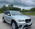 Серый БМВ Х5, объемом двигателя 3 л и пробегом 242 тыс. км за 14064 $, фото 1 на Automoto.ua