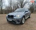 Серый БМВ Х5, объемом двигателя 3 л и пробегом 180 тыс. км за 18700 $, фото 1 на Automoto.ua
