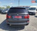 Серый БМВ Х5, объемом двигателя 3 л и пробегом 255 тыс. км за 12992 $, фото 18 на Automoto.ua