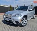 Серый БМВ Х5, объемом двигателя 3 л и пробегом 256 тыс. км за 19900 $, фото 1 на Automoto.ua