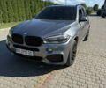 Серый БМВ Х5, объемом двигателя 3 л и пробегом 305 тыс. км за 28000 $, фото 3 на Automoto.ua