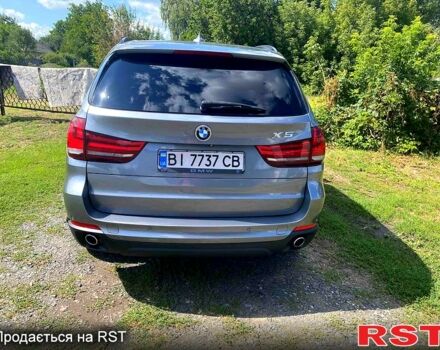 Серый БМВ Х5, объемом двигателя 3 л и пробегом 308 тыс. км за 28000 $, фото 1 на Automoto.ua