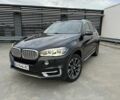 Серый БМВ Х5, объемом двигателя 3 л и пробегом 242 тыс. км за 17000 $, фото 1 на Automoto.ua