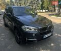 Сірий БМВ Х5, об'ємом двигуна 2 л та пробігом 196 тис. км за 26500 $, фото 2 на Automoto.ua