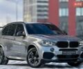 Серый БМВ Х5, объемом двигателя 3 л и пробегом 180 тыс. км за 31500 $, фото 1 на Automoto.ua