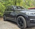 Серый БМВ Х5, объемом двигателя 3 л и пробегом 252 тыс. км за 21900 $, фото 2 на Automoto.ua