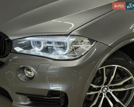 Серый БМВ Х5, объемом двигателя 2 л и пробегом 109 тыс. км за 29799 $, фото 2 на Automoto.ua
