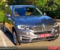 Серый БМВ Х5, объемом двигателя 2 л и пробегом 170 тыс. км за 21100 $, фото 1 на Automoto.ua