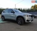 Серый БМВ Х5, объемом двигателя 3 л и пробегом 215 тыс. км за 19900 $, фото 1 на Automoto.ua
