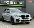 Сірий БМВ Х5, об'ємом двигуна 2 л та пробігом 218 тис. км за 25000 $, фото 1 на Automoto.ua