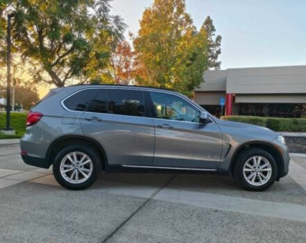 Серый БМВ Х5, объемом двигателя 3 л и пробегом 77 тыс. км за 14600 $, фото 3 на Automoto.ua