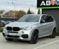 Сірий БМВ Х5, об'ємом двигуна 2 л та пробігом 218 тис. км за 25000 $, фото 2 на Automoto.ua