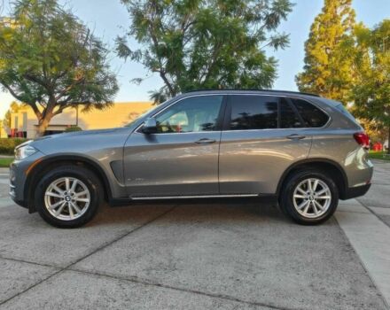 Серый БМВ Х5, объемом двигателя 3 л и пробегом 77 тыс. км за 14600 $, фото 4 на Automoto.ua